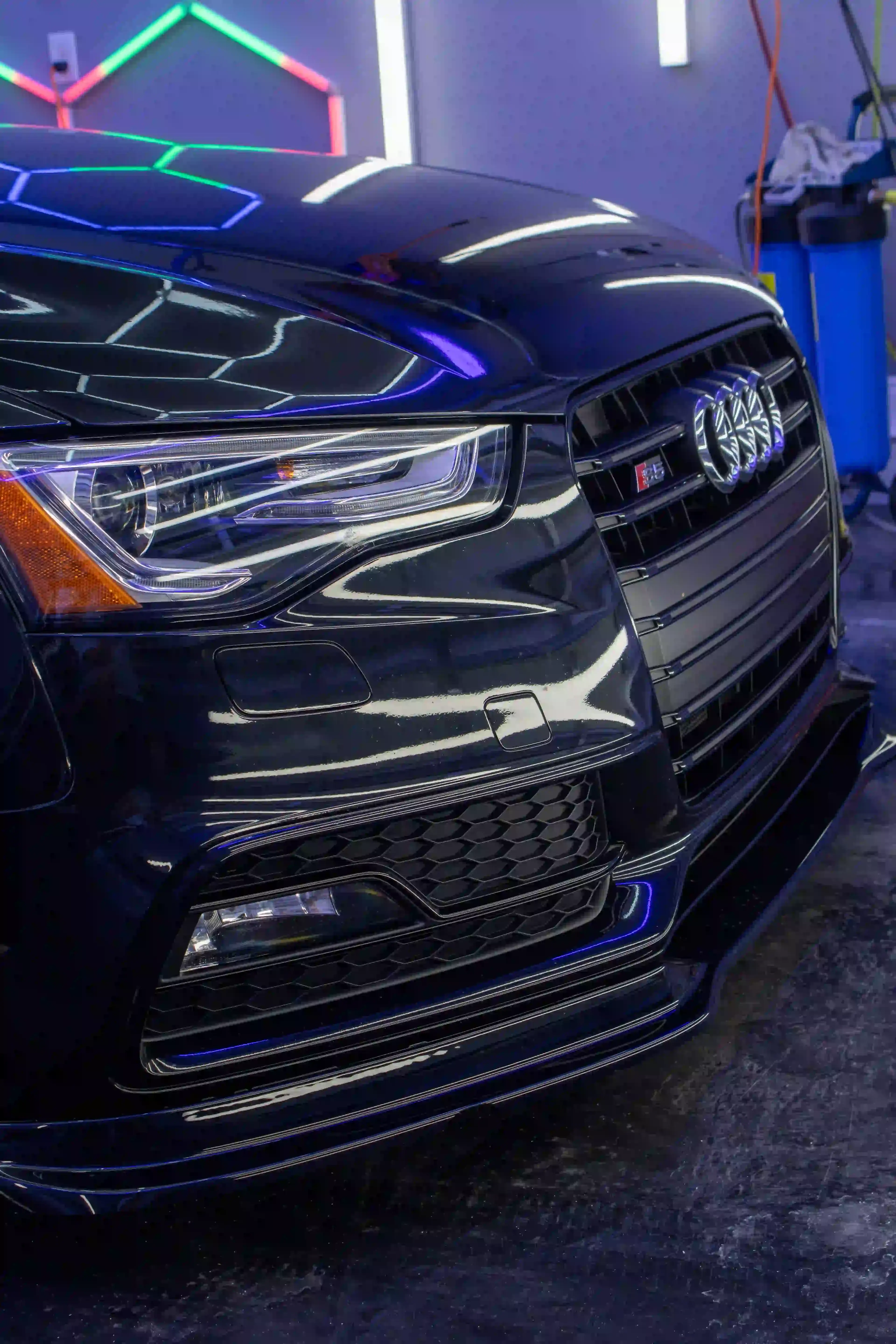 Audi S5 front grille with deep gloss ceramic coating under studio lighting