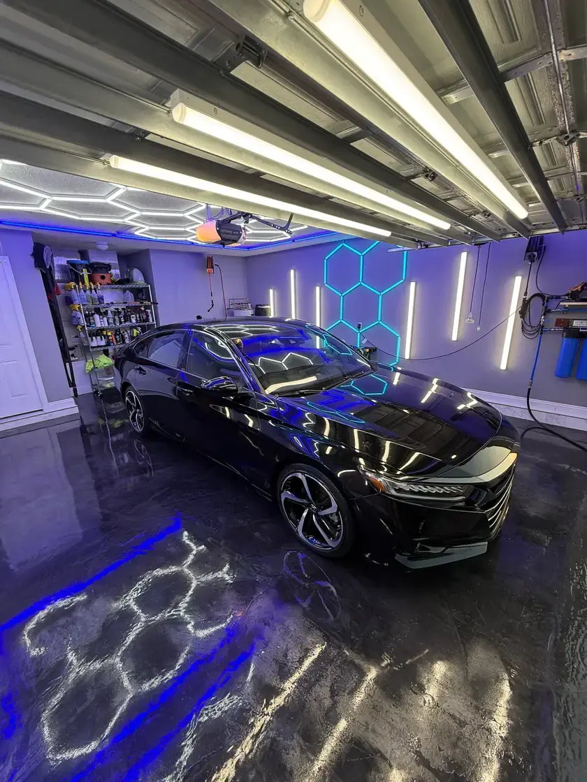 Black 2022 Honda Accord Sport after a full interior and exterior detail under the hex lights at Ceramico in Panama City FL