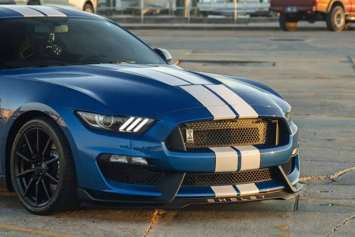 Blue 2018 Ford Shelby GT350 with white racing stripes freshly ceramic coated in Panama City FL