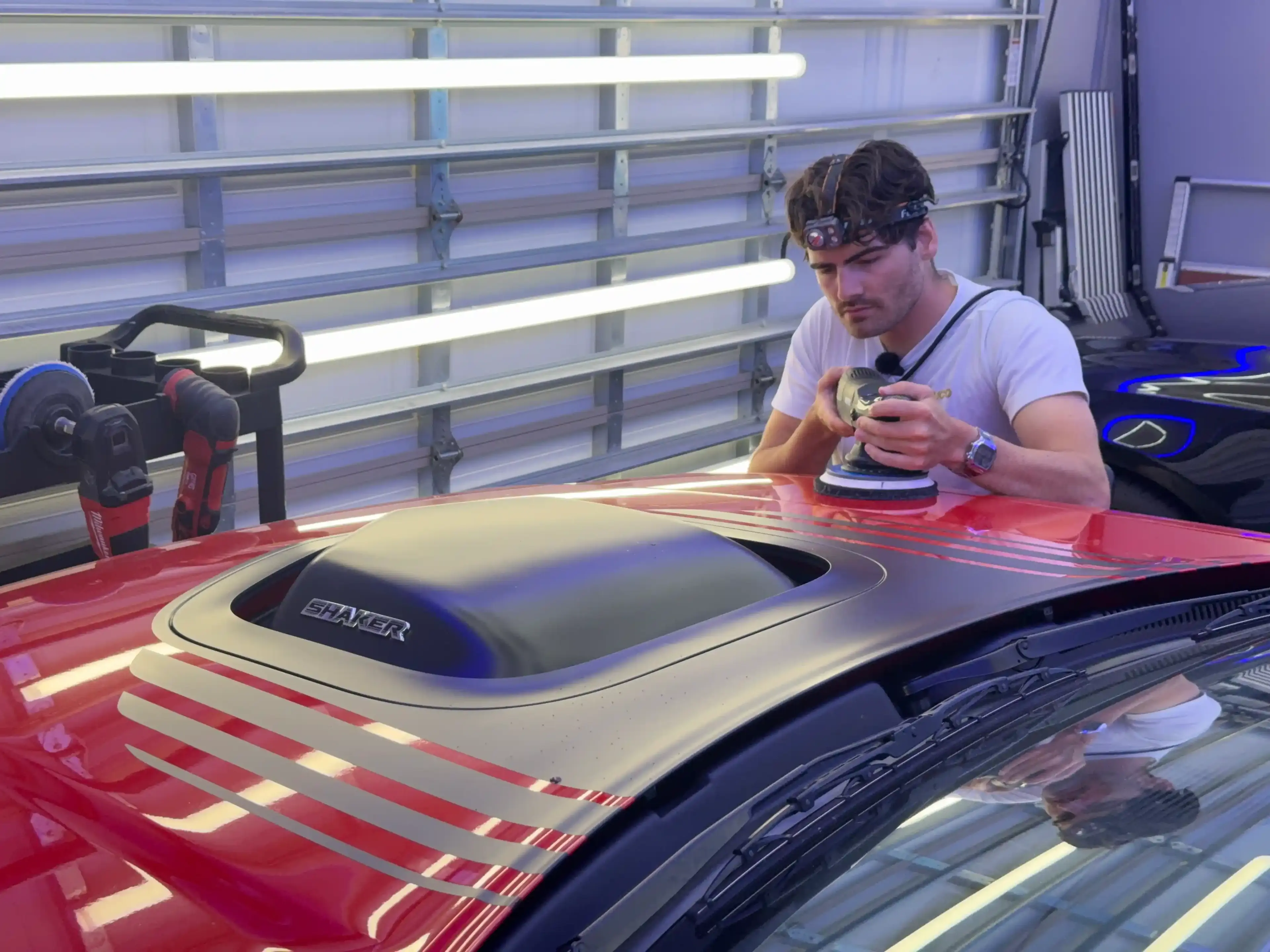Ceramico owner Jonny hand detailing a car in Panama City FL